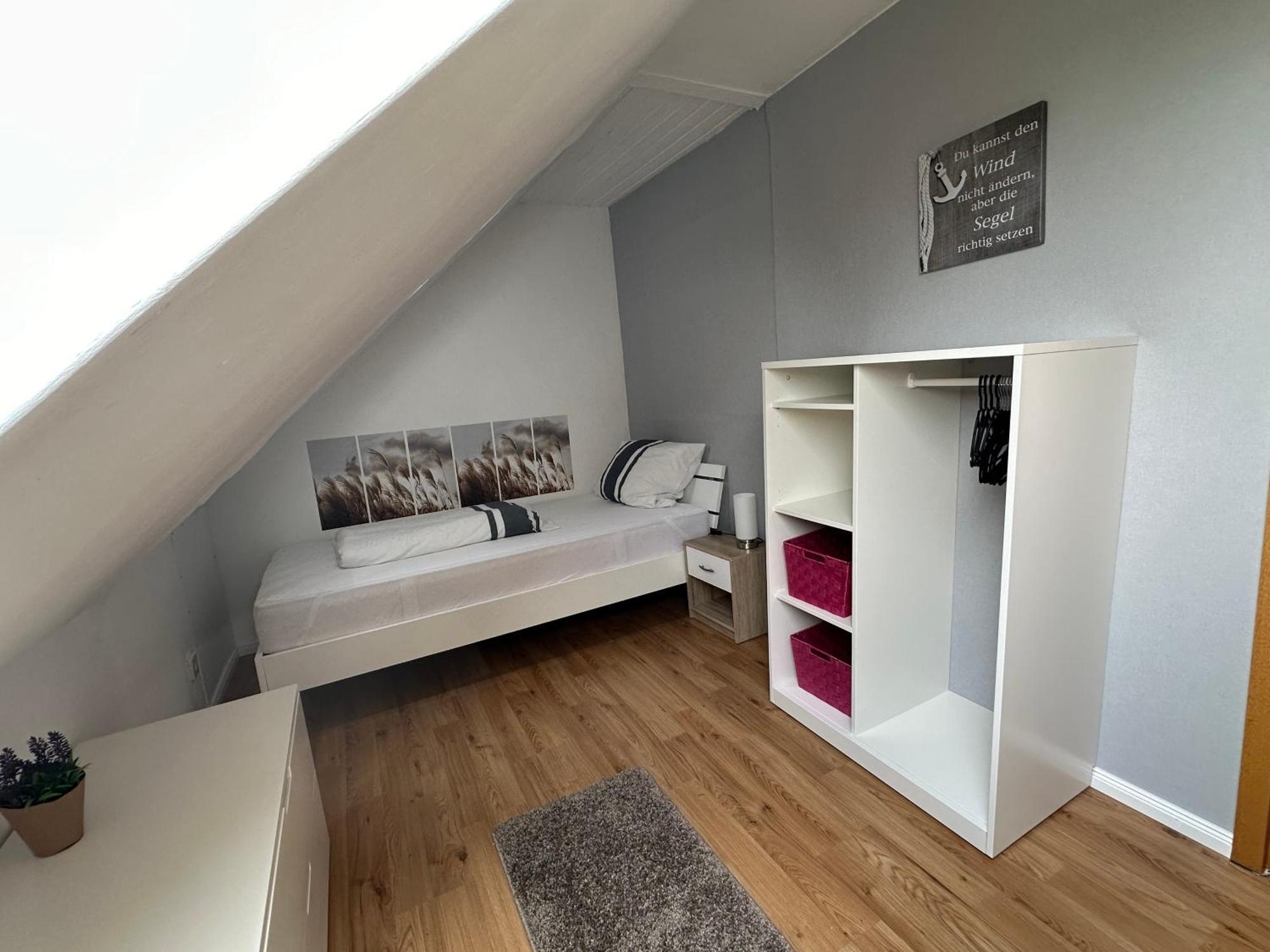 Rosenhaus Esens - Wohnung Backbord Extérieur photo